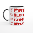 White and black ceramic "Eat Sleep Game Repeat" gaming mug with red pixel art icons and Japanese kanji text for eat, sleep, game and repeat – funny gamer gift mug